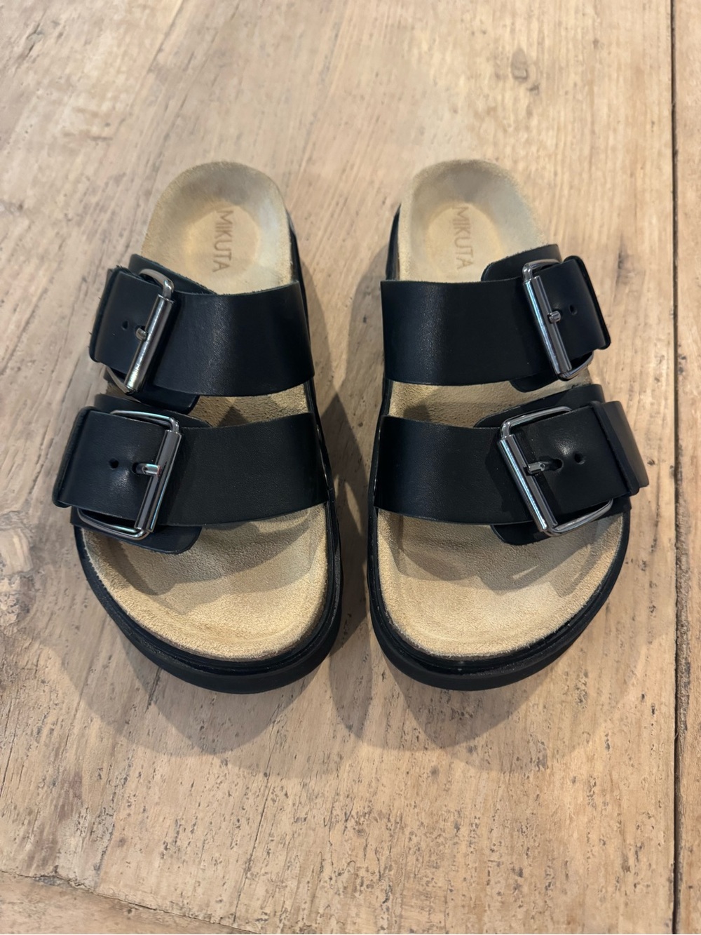 Mikuta The Black Leather Buckle Sandals